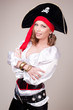 Beautiful woman in carnival costume. Pirate shape.