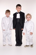 Adorable children in  business suits over white.
