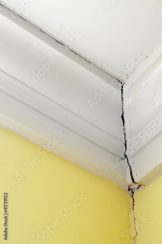 Photo: crack in a house wall and ceiling crack in a house wall and ceiling
