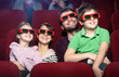 Photo: Smiling family in the movie theater Smiling family in the movie theater