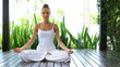 Woman in lotus position meditating