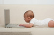 Photo: Baby mit Computer Baby mit Computer