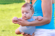 baby boy flying on mother hands