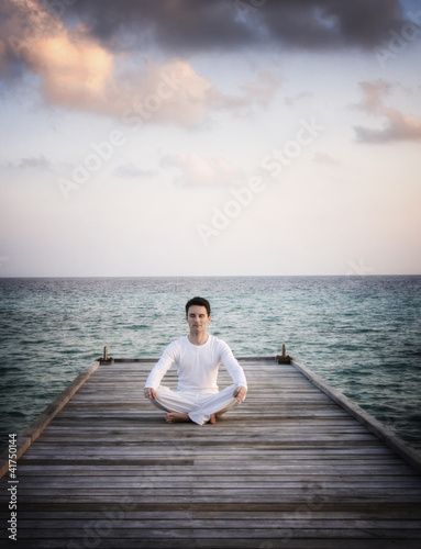 Photo: Meditation Man sitting on a jetty (Maldives) Meditation Man sitting on a jetty (Maldives)