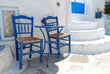 Photo: Dos sillas en una calle de Pyrgos. Santorini. Grecia.. Dos sillas en una calle de Pyrgos. Santorini. Grecia..