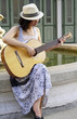 young woman with guitar