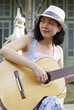 young woman with guitar