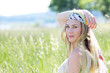 Beautiful blond woman in meadow with modern look Beautiful blond woman in meadow with modern look