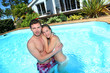 Young couple in private swimming pool
