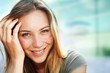 Portrait of beautiful blond smiling woman