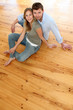 Couple at home relaxing on the floor