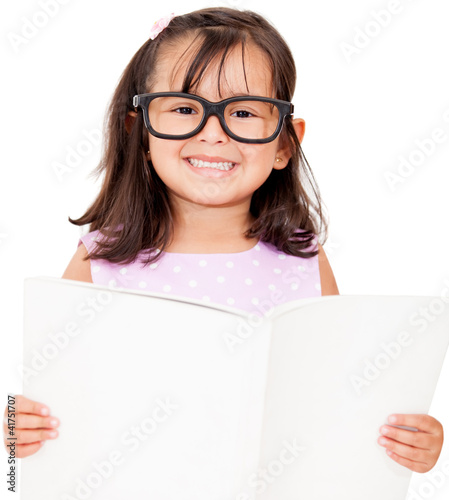 Photo: Girl student reading book Girl student reading book
