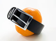 Orange in a leather belt
