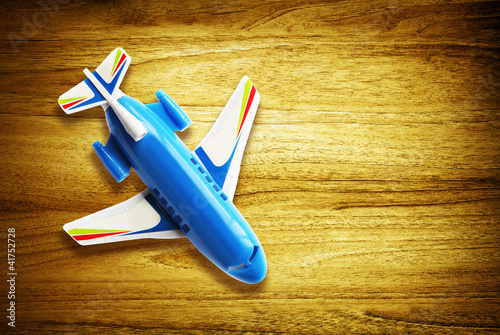 Photo: toy plane on desk toy plane on desk