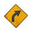 Road curved ahead sign
