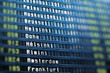 Flights information board in airport terminal