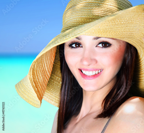 Photo: Beautiful girl on a tropical beach Beautiful girl on a tropical beach