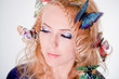 Face of a beautiful woman butterflies in hair Face of a beautiful woman butterflies in hair