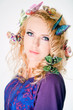 Beautiful woman with butterflies in hair Beautiful woman with butterflies in hair