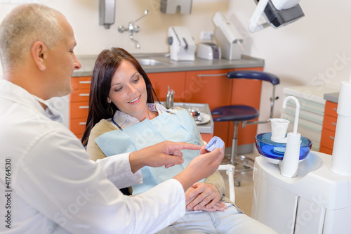 Photo: Woman visit dentist orthodontic surgery Woman visit dentist orthodontic surgery