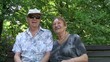 Senior couple in the park (smiling)