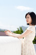 Beautiful young woman outdoors over blue sky Beautiful young woman outdoors over blue sky