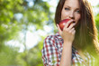 Beautiful woman  in the garden with apples
