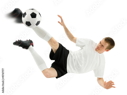 Photo: Fußballer zeigt einen pfiffigen Schuss Fußballer zeigt einen pfiffigen Schuss