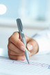 Hand with pen