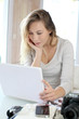 Woman working at home on laptop computer Woman working at home on laptop computer