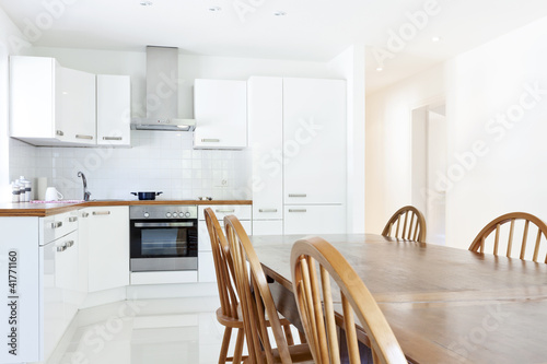 Photo: interior house, large modern kitchen, dining table interior house, large modern kitchen, dining table