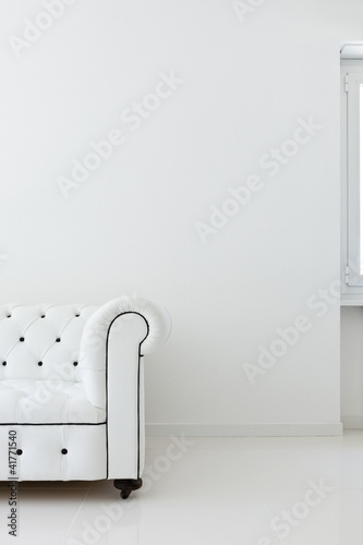 Photo: interior, leather sofa in white room interior, leather sofa in white room