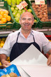 Foto: Smiling greengrocer Smiling greengrocer