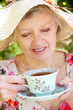 pretty lady about to drink tea pretty lady about to drink tea