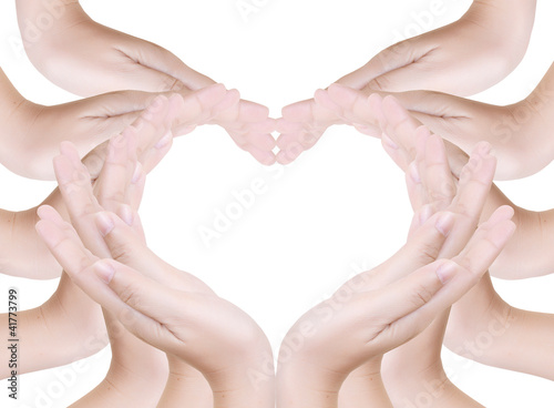 Photo: Love heart make by hand isolated. Love heart make by hand isolated.