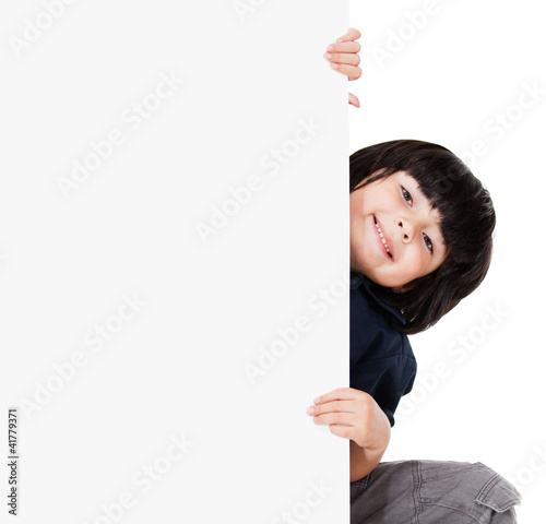Photo: Boy holding banner Boy holding banner