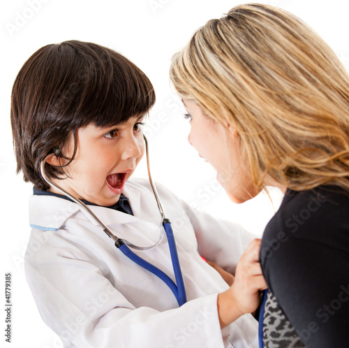 Photo: Young doctor listening to heart Young doctor listening to heart