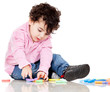 Boy playing with letters