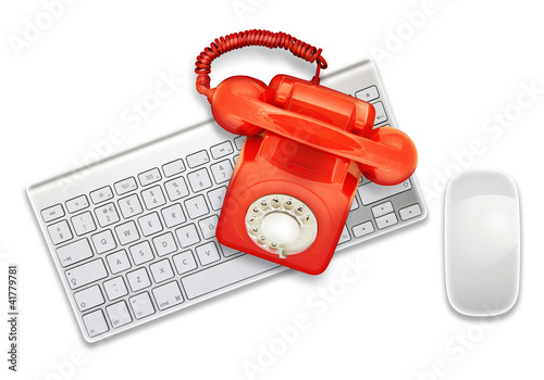 Foto: red telephone on keyboard red telephone on keyboard