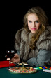 The beautiful girl with playing card