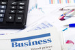 Business the newspaper with chart