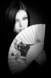 Beautiful girl with fan