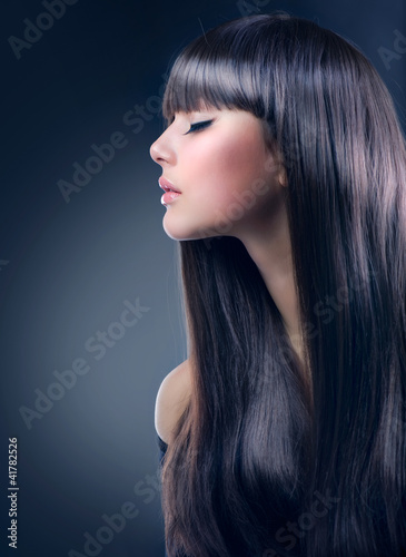 Photo: Fashion Brunette Girl. Healthy Long Hair Fashion Brunette Girl. Healthy Long Hair