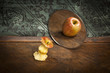 surrealistic picture of an apple reflecting in the mirror