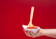 Hand Holding A Bowl With Ragù