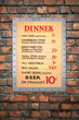 Vintage Cafe Menu on Brick Wall
