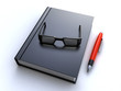 book with glasses and pen