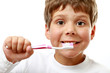 The boy and the  toothbrush. Isolated on white background