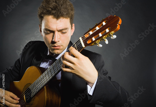 Photo: Playing the guitar Playing the guitar