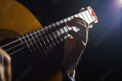 Photo: Playing the guitar Playing the guitar